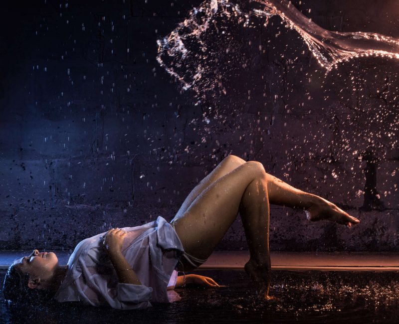 Girl,In,The,White,Shirt,With,Water,Drops,And,Dark